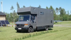 Solar Caravan Park - black campervan